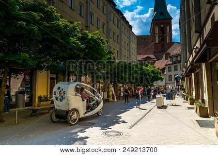 Berlin, Germany, May 25, 2015: Street With A View Of The Church Of St. Nicholas. Located In The Hist