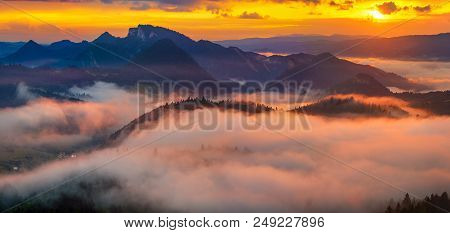 Spectacular, Fairytale Sunset Over The Mountains, Floating Mist Highlighted By The Setting Sun, Pien