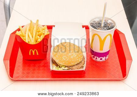 Moscow, Russia, March 15 2018: McDonald's Big Mac hamburger menu, French Fries and Coca Cola