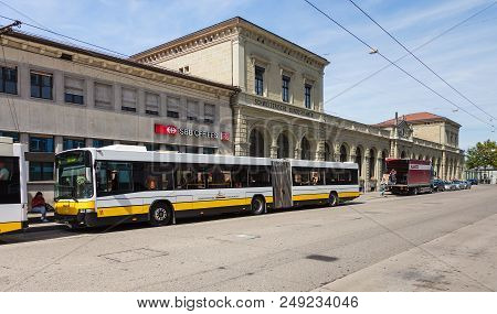 Schaffhausen, Switzerland - August 26, 2015: Buses, People And The Building Of The Schaffhausen Rail