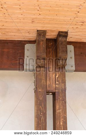 Wood Beam And Pillar Junction Professionally Connected By Metal Screw Plate
