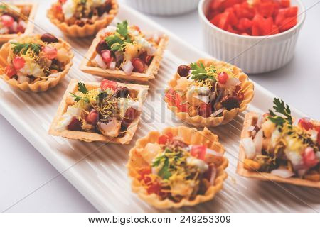 Crispy Canape Or Canapé Is A Starter Recipe From India - Round Or Square Shaped Puri Filled With Yog