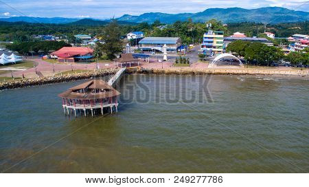 Sipitang,sabah-july 6,2018:aerial View Of The Wooden Pier Or Jetty With Hut At Esplanade In Sipitang