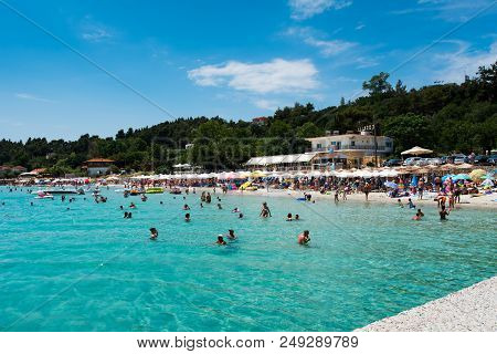Chaniotis, Greece - June 23, 2018: Popullar Chaniotis City Beach In Kassandra, Chalkidiki With Many 