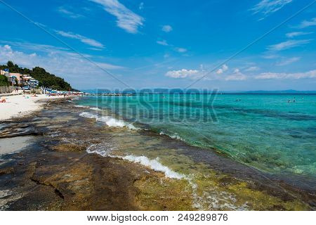 Chaniotis, Greece - June 23, 2018: Popullar Chaniotis City Beach In Kassandra, Chalkidiki With Many 