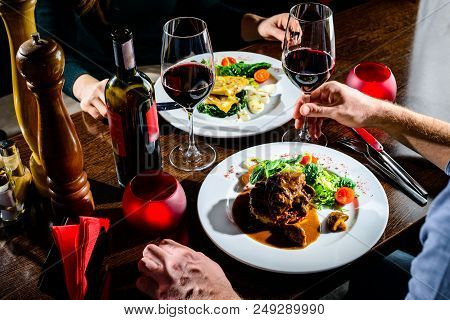 Couple Having Romantic Dinner In A Restaurant