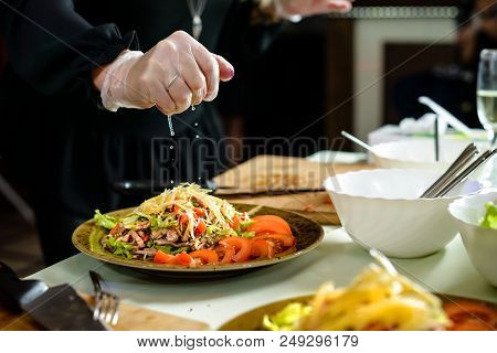 Master Class In Preparing Meat Salad With Tomatoes, Cheese And Salad