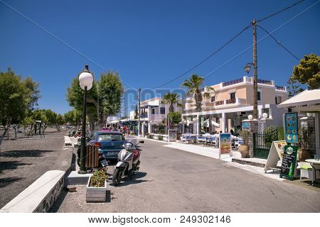 PERMISSA, GREECE- JUN 11, 2016: Permissa main road near black sand beach in Santorini on Jun 11, 2016. Greece. 