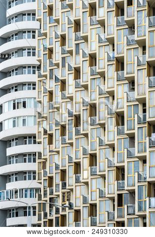 Facade of a big multistorey building with many windows