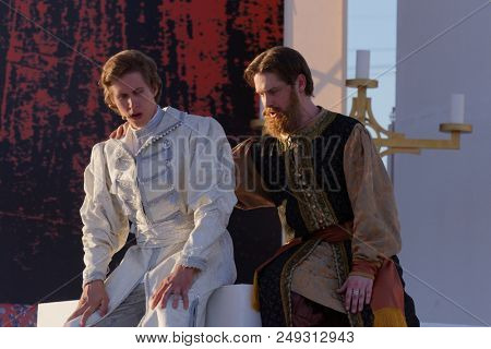 ST. PETERSBURG, RUSSIA - JULY 12, 2018: Yevgeny Chernyadiev as Sobakin (right) and Ilya Selivanov as Lykov in the opera The Tsar's Bride outdoors during the festival All Together Opera