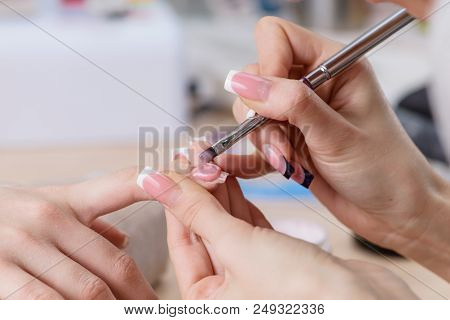 Manicurist At Work, Painting Nails In Nail Salon, Uv Lap Of Quick Dry Nail Polish Manicure, Focus On