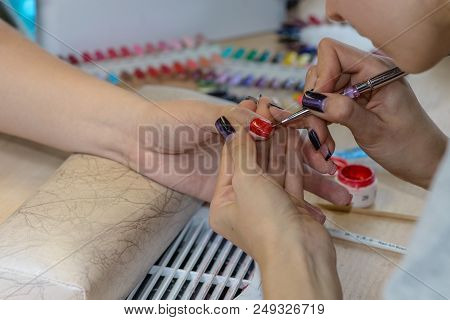 Painting Nails In Nail Salon, Uv Lap Of Quick Dry Nail Polish Manicure, Focus On Brush