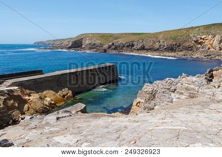 Pors Loubous Harbor And Breakwater In Plogoff During A Sunny Spring Day