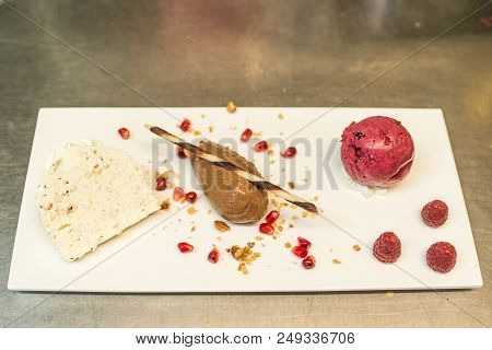 Piece Of Brown Mousse A U Chocolate Sweet Dessert And Decoration On A White Plate Background