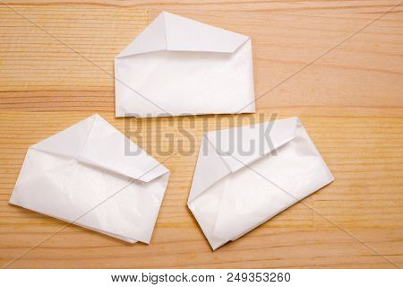 Medicine Powder Wrapped In Paraffin Paper On Wood Table
