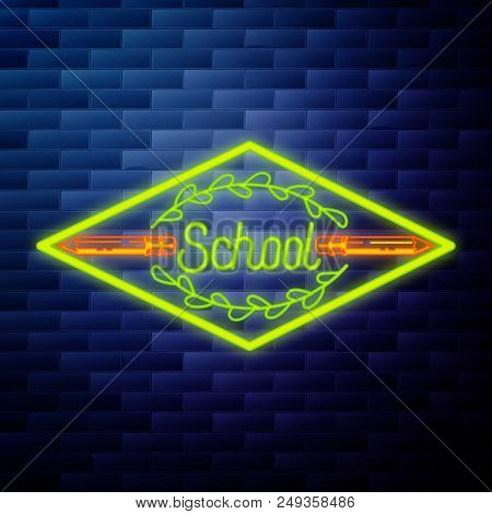 Vintage Back To School Emblem Glowing Neon Sign On Brick Wall Background