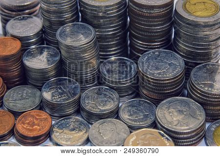Many Coins Stacked For Saving And Investment Economy Concept.