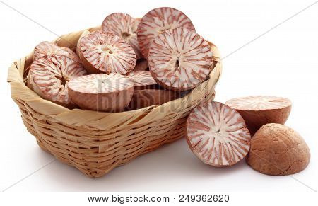 Betel Nuts In A Basket Over White Background