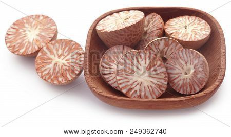 Betel Nuts In A Bowl Over White Background