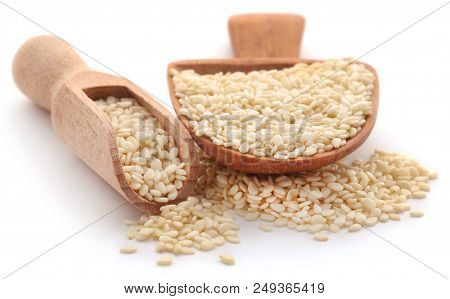 Closeup Of Peeled Sesame Seeds Over White Background