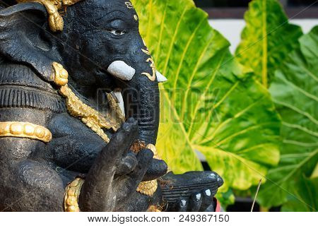 Statue Ganesha In A Garden Of Balinese House In Ubud