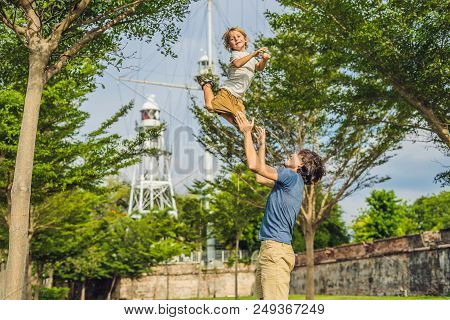 Dad And Son On Background Of Fort Cornwallis In Georgetown, Penang, Is A Star Fort Built By The Brit