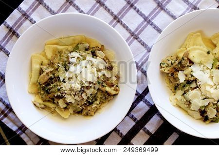 Fresh Ricotta And Spinach Agnolotti With Chicken And Vegetable Sauce.