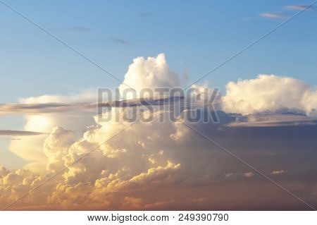 Heapy Clouds With Warm Sunset's Ray.
