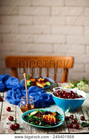 Grilled Halumi  Cheese Salad With Berries.food Gathering.selective Focus