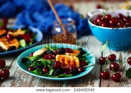 Grilled Halumi  Cheese Salad With Berries.food Gathering.selective Focus