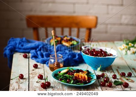 Grilled Halumi  Cheese Salad With Berries.food Gathering.selective Focus