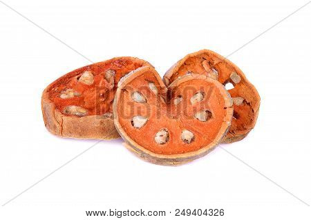Dry Bael Slices Fruit Isolated In White Background. Dry Herb For Healthy Beverage.
