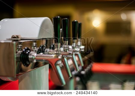 Close Up Draft Beer And Lemonade Dispensing Tower Of A Bar Restaurant