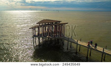 Sipitang,sabah-july 6,2018:aerial View Of The Wooden Pier Or Jetty With Hut At Esplanade In Sipitang