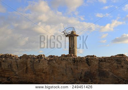 A Ruined Lighthouse In The Coastal Town Of Batroun, Lebanon.
