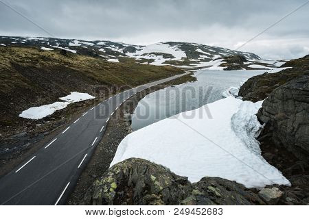 Mountain road Bjorgavegen and Flyvotni Lake. Norwegian Tourist Route Aurlandsfjellet runs from Aurlandsvangen to Laerdalsoyri