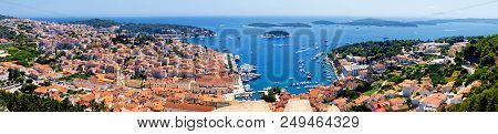 Beautiful Wide Panorama Photo Of Hvar Town With The Harbor In Croatia