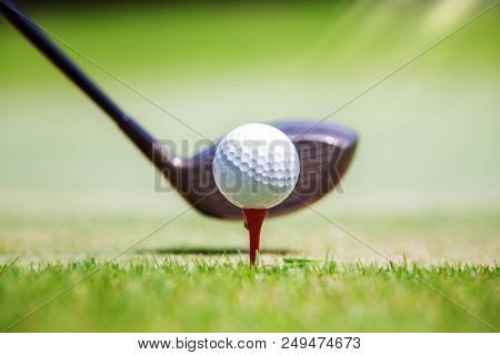 Golf Ball At Tee Off Position On Green This Photo Can Use For Sport, Relax And Holiday Concept