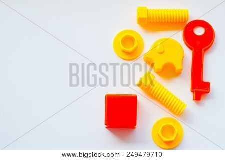Set Of Toys For Babies On A White Table