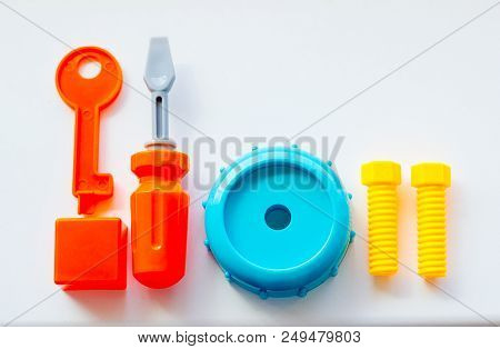 Set Of Toys For Babies On A White Table