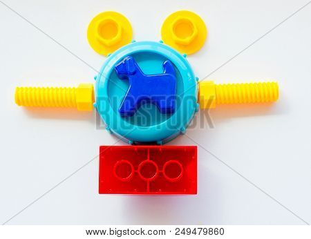 Set Of Toys For Babies On A White Table