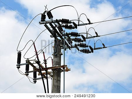 Concrete Pylon And Hig Voltage Distribution In Day