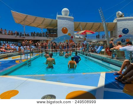 Cape Canaveral, Usa - May 03, 2018: The People Playing At Pool At Upper Deck In Mini Volleyball At C