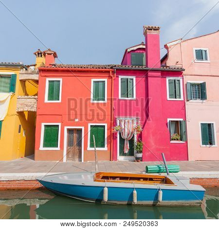 Rectilinear View Of The Colored Facades Of Buildings On The Island Of Burano, Near Venice, Italy