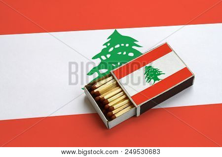 Lebanon Flag  Is Shown In An Open Matchbox, Which Is Filled With Matches And Lies On A Large Flag.
