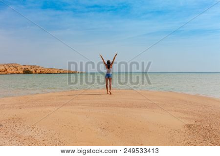 Tourist Woman At The Red Sea Coast In The Ras Mohammed National Park. Famous Travel Destionation In