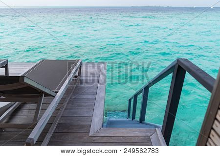 Beautiful Tropical Maldives Island Summer Vacation Relaxing At Overwater Villa In Luxury Resport.