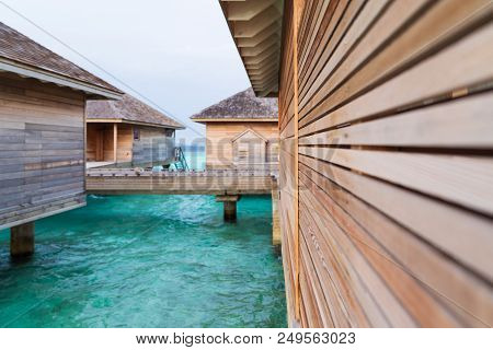Beautiful Tropical Maldives Island Summer Vacation Relaxing At Overwater Villa In Luxury Resport.