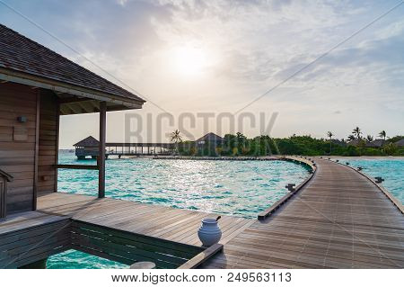 Beautiful Tropical Maldives Island Summer Vacation Relaxing At Overwater Villa In Luxury Resport.