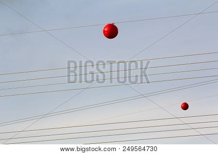 High Voltage Power Line With Big Ball For Warning Pilots, Low Flying Aircraft And Helecopter.